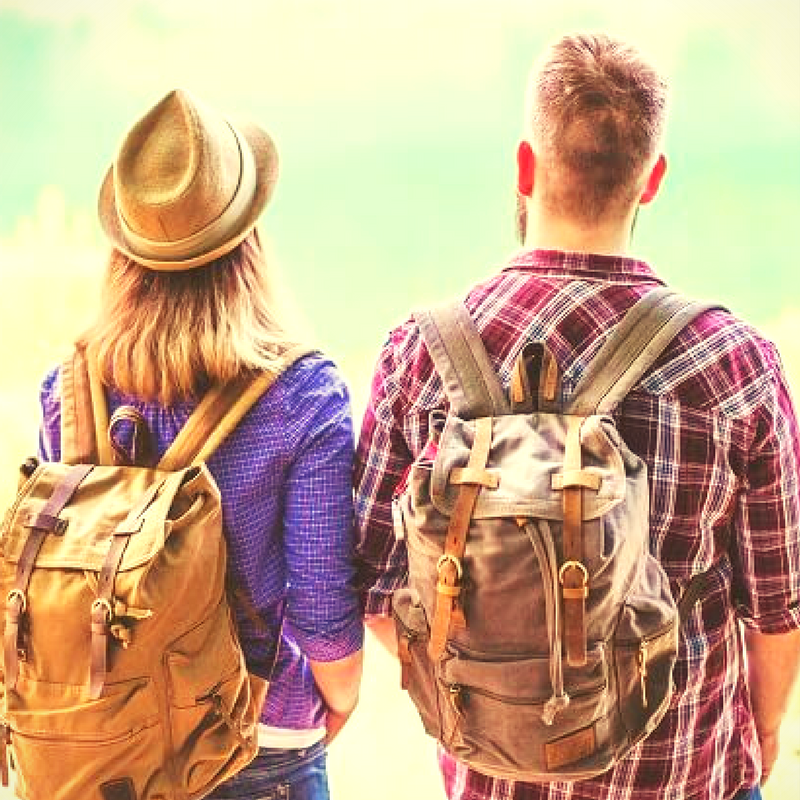 Young couple with backpacks