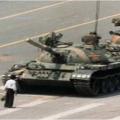 Man standing in front of a tank