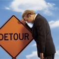Person with detour sign